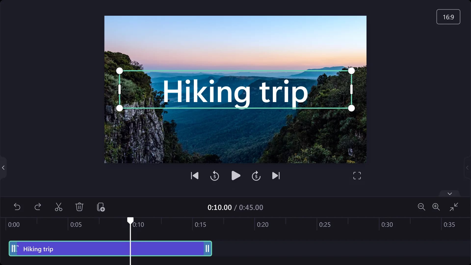 The Clipchamp editor with a text overlay selected on the video preview above the timeline
